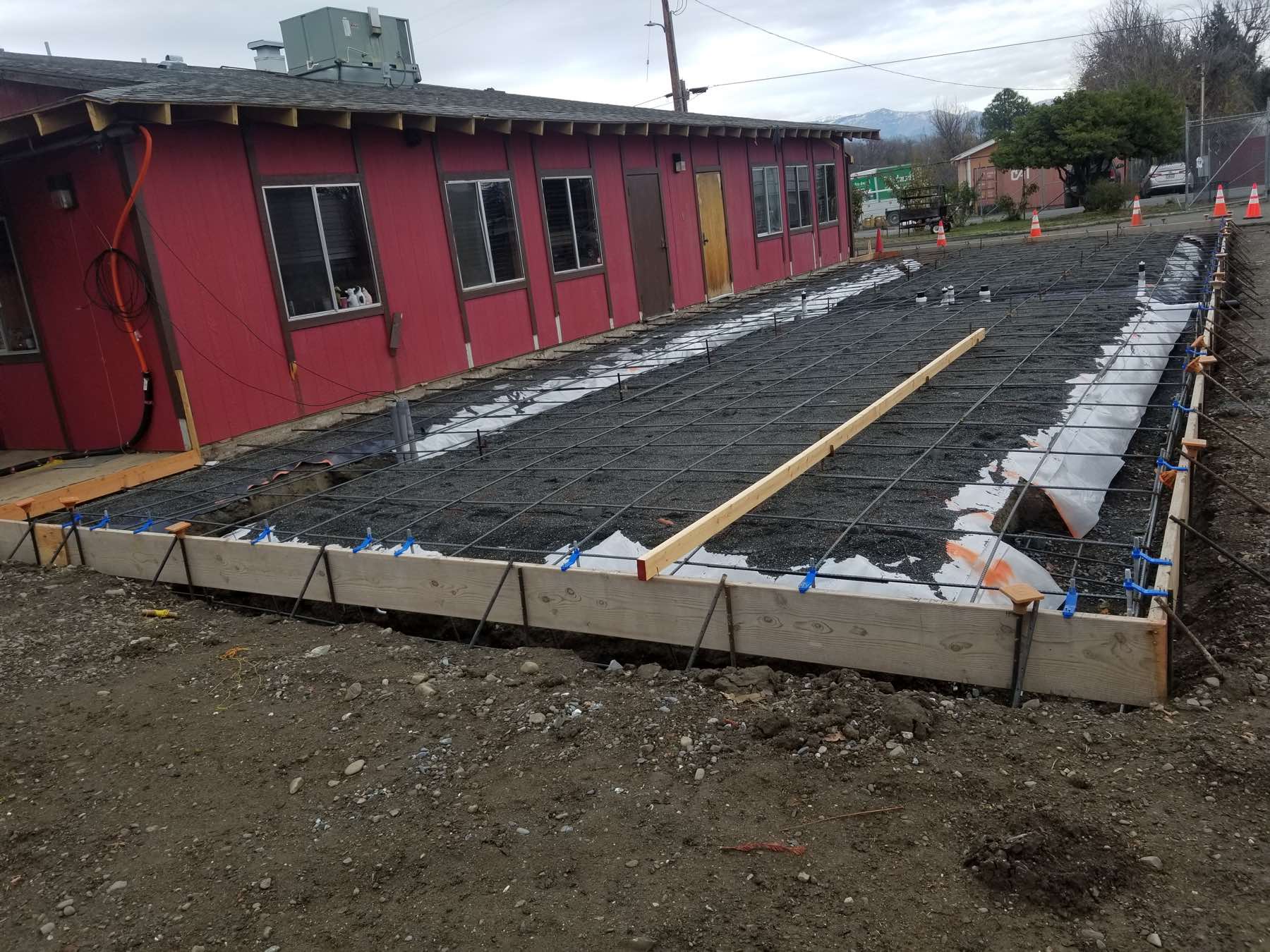 A closer picture of the new concrete pad outside of the main building
